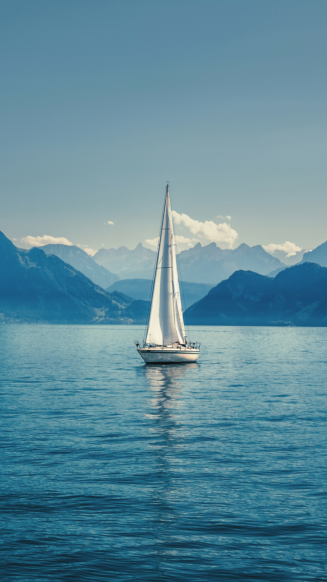 White sailboat on water