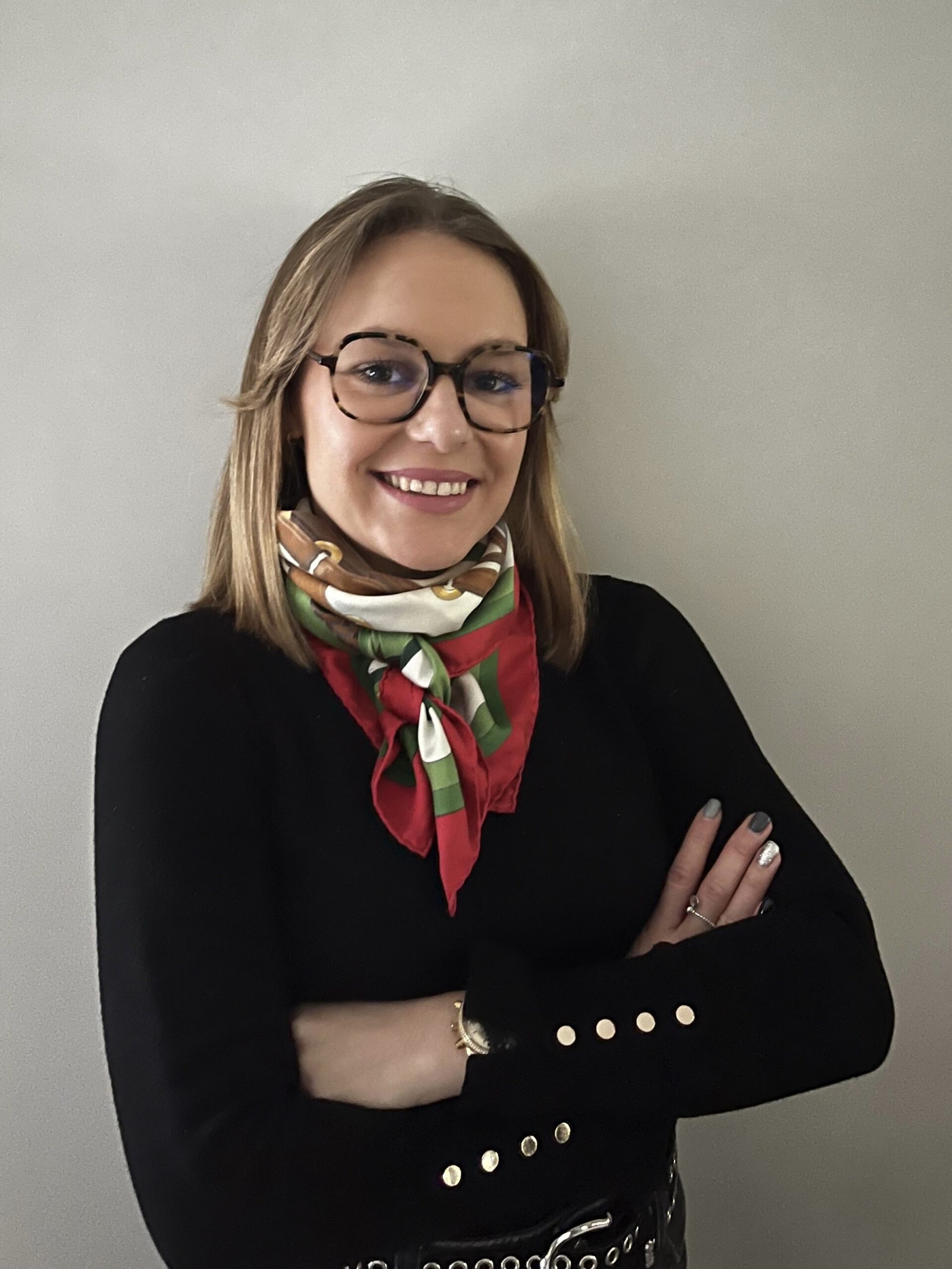 Julie Demarquilly portrait, smiling to camera